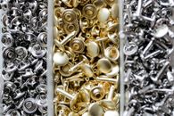 Stacks of Single Round Cup Metal Studs in Close-up