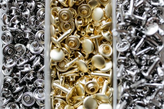 Stacks of Single Round Cup Metal Studs in Close-up