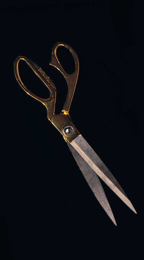 Photo of a Steel Scissors with Black Background