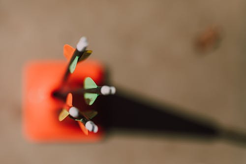 Close Up Photo Of Plastic Arrows In Archery Practice