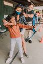 A Girl Holding an Archery Bow