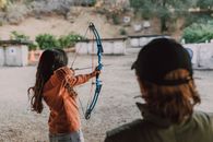 A Girl Holding an Archery Bow