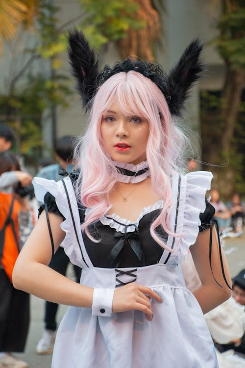 A Young Woman Wearing a Black and White Dress