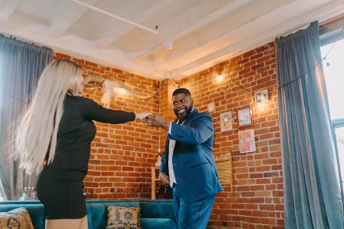 A Low Angle Shot of a Couple Dancing Together