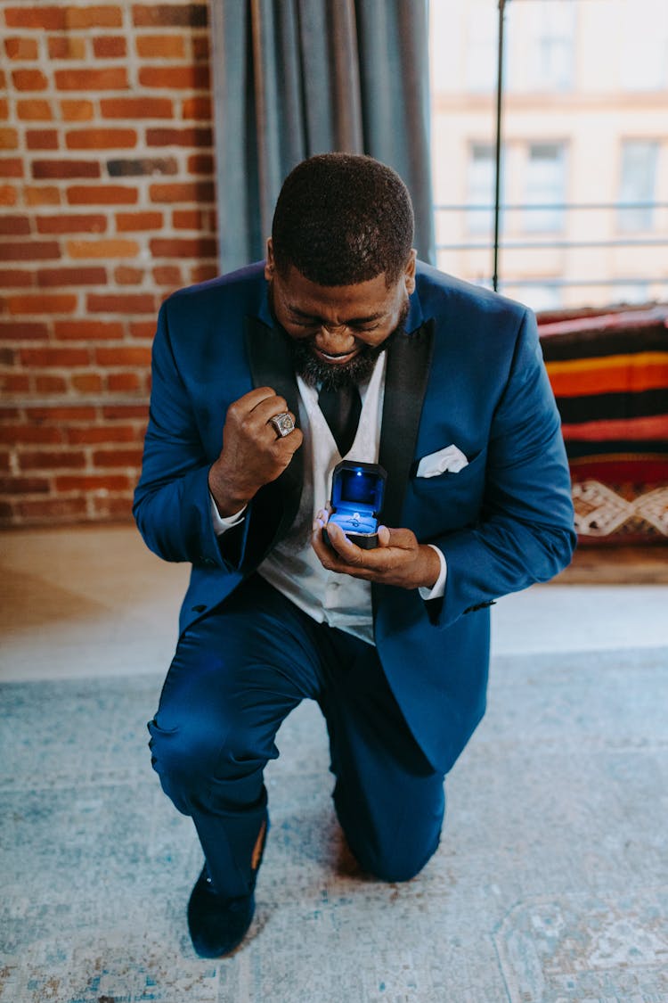 Man In Blue Coat Proposing