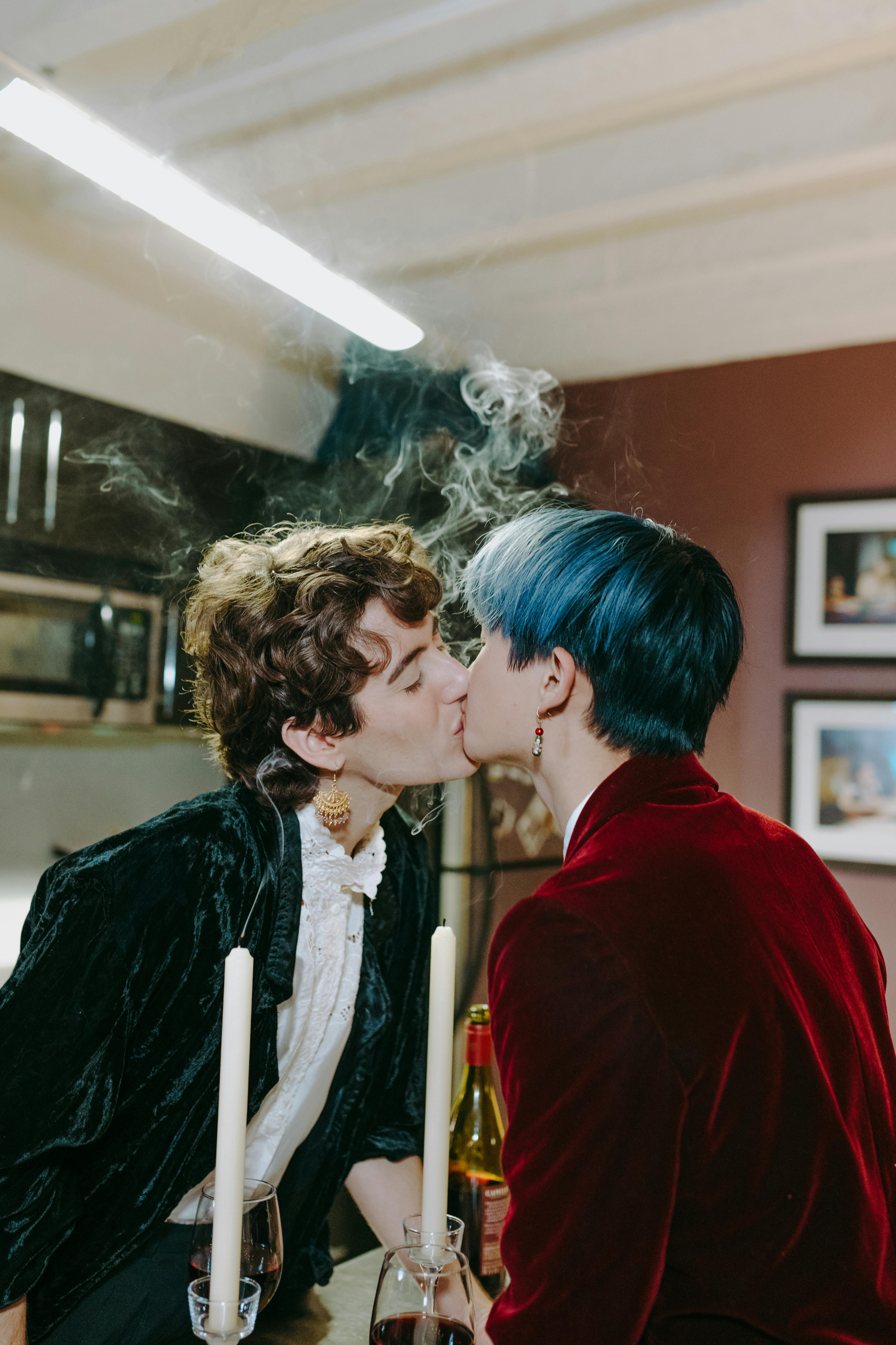 a same sex couple kissing each other