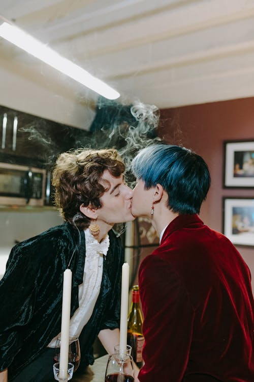 A Same Sex Couple Kissing Each Other