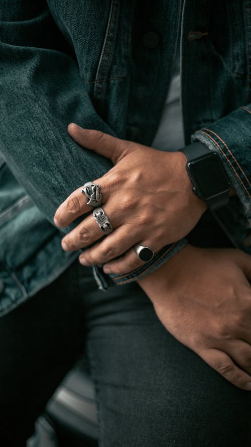 Free Close-Up Photo of a Person's Hands Wearing Rings  Stock Photo