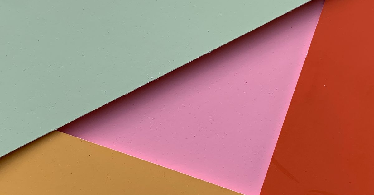 Colorful Cardboards Forming a Triangle · Free Stock Photo