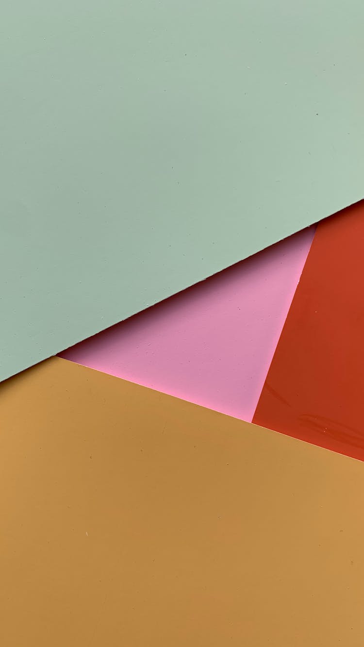 Colorful Cardboards Forming A Triangle