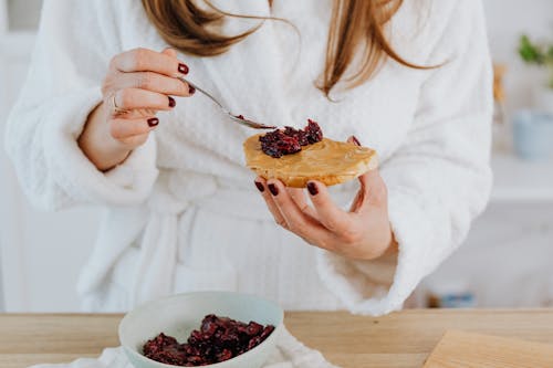 Free Spreading of Jam on Toast  Stock Photo