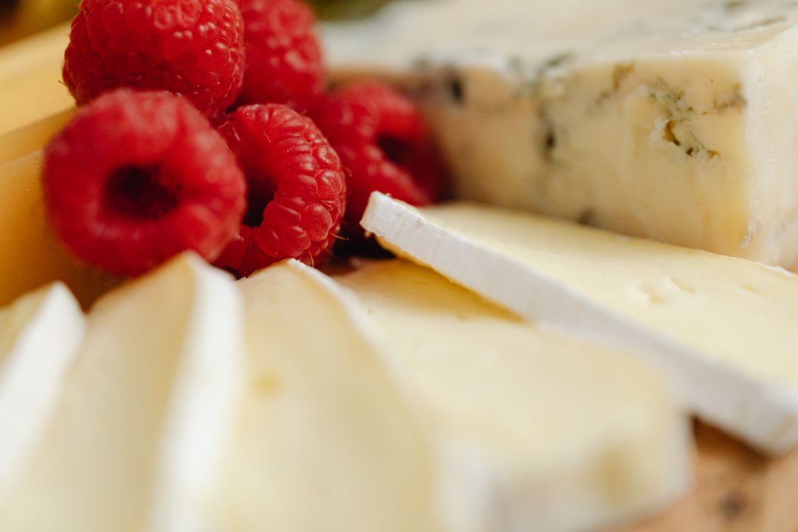 A Close-up Shot of a Raspberries and Cheese · Free Stock Photo