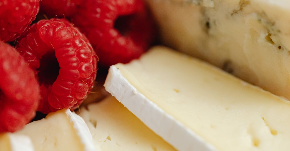 A Close-up Shot of a Raspberries and Cheese · Free Stock Photo