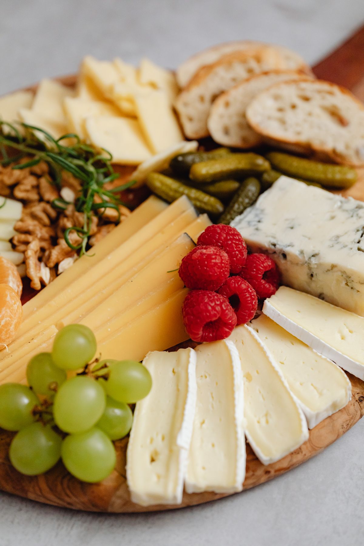 Cheese platter with grapes for thanksgiving charcuterie board ideas