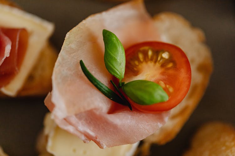 Close-up Shot Of Prosciutto Ham On Bread