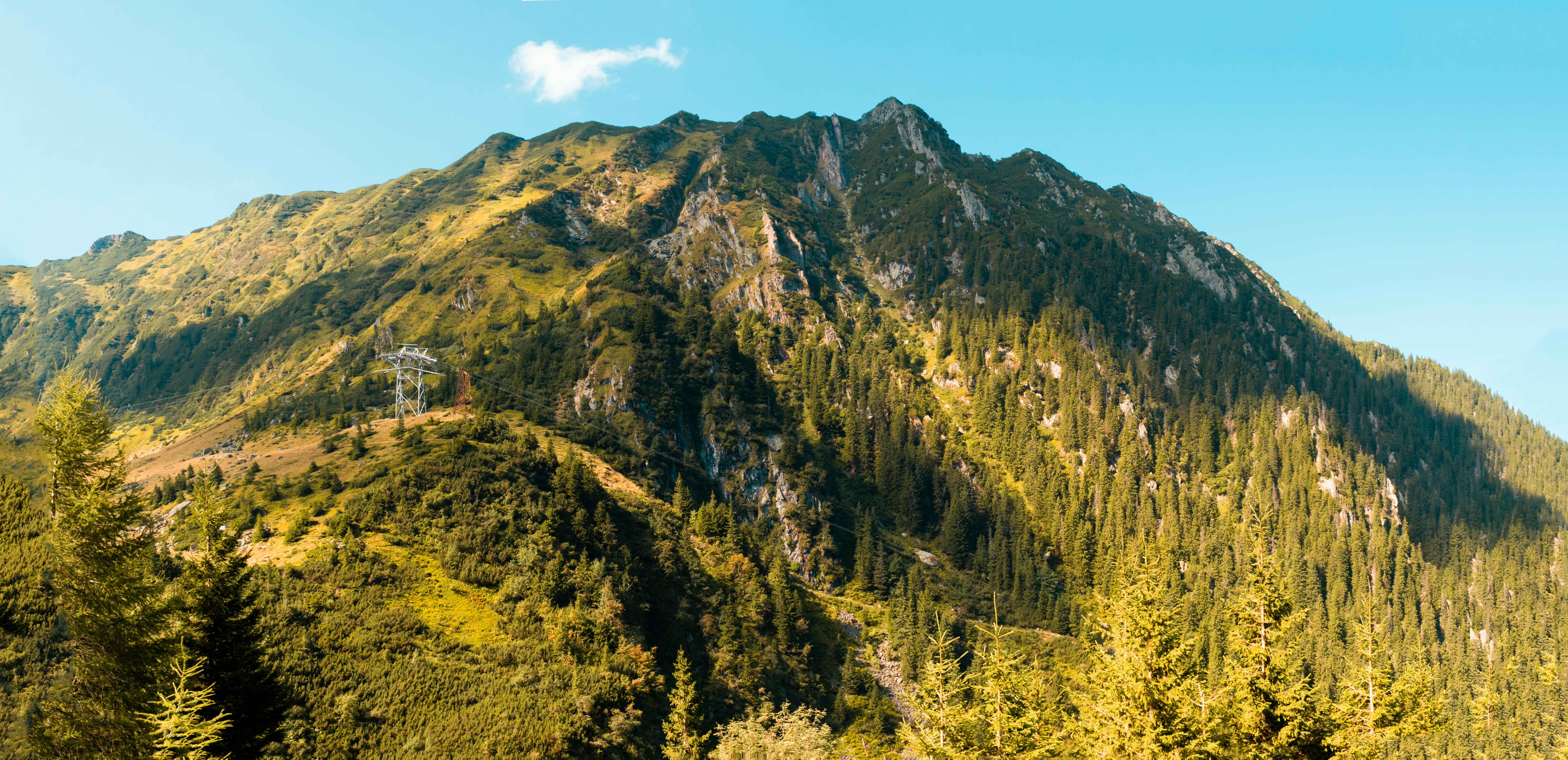 Explore the breathtaking landscape of Fagaras Mountains in Curtea de Argeș, Romania.