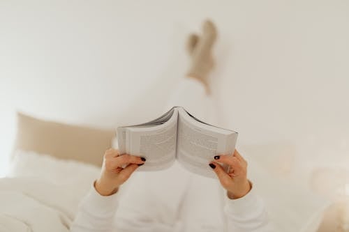 Free Woman Holding a Book Stock Photo