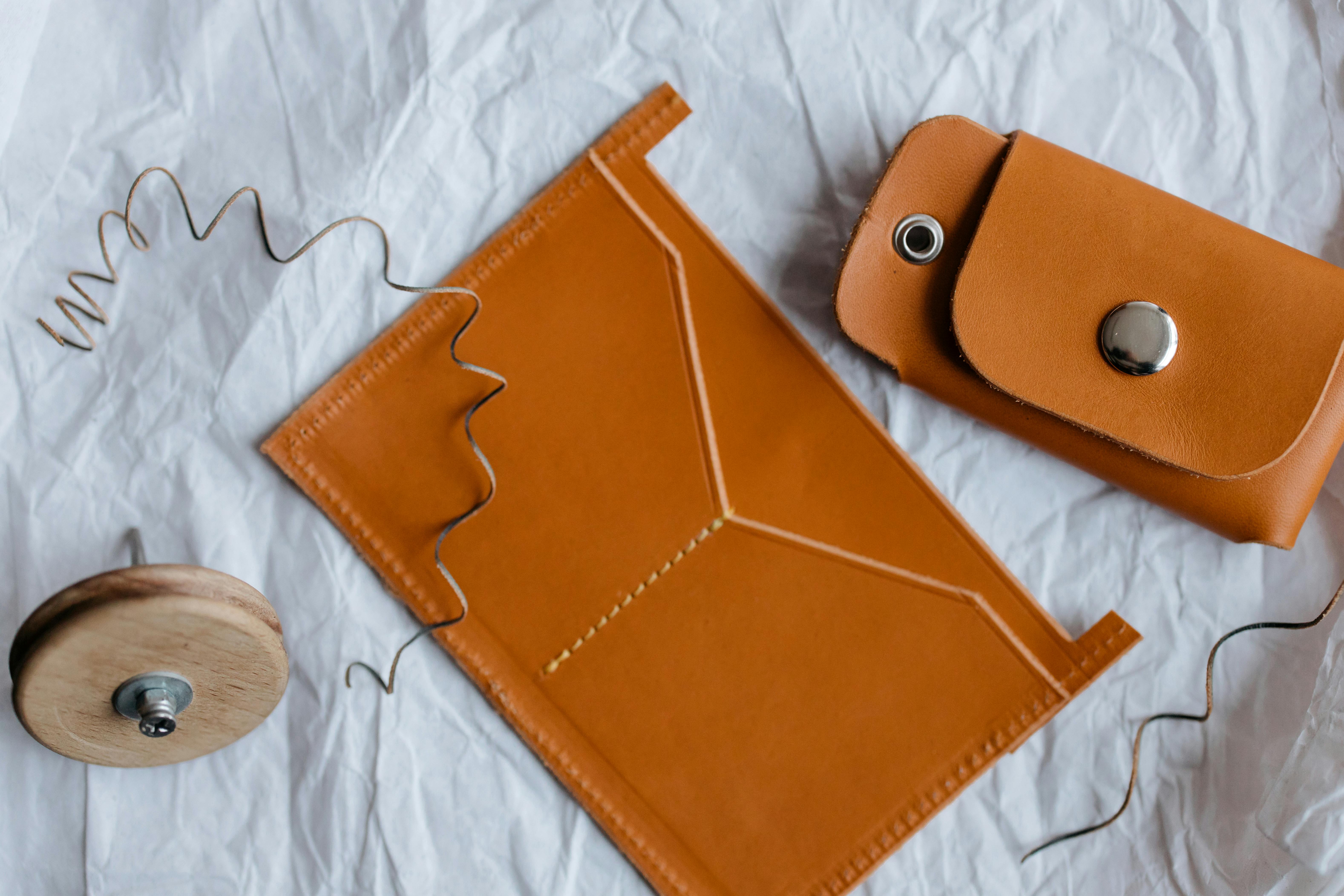 brown leather material on the white surface