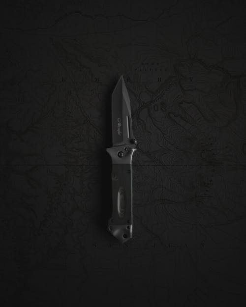 Grayscale Photograph of a Knife