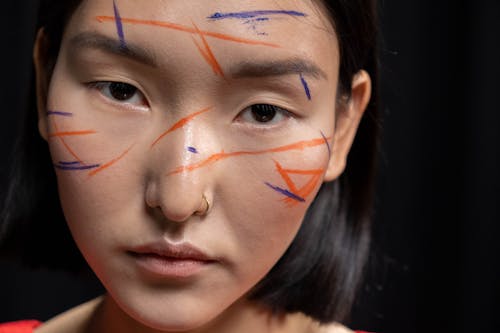 Безкоштовне стокове фото на тему «азіатська жінка, впритул, кільце в носі»