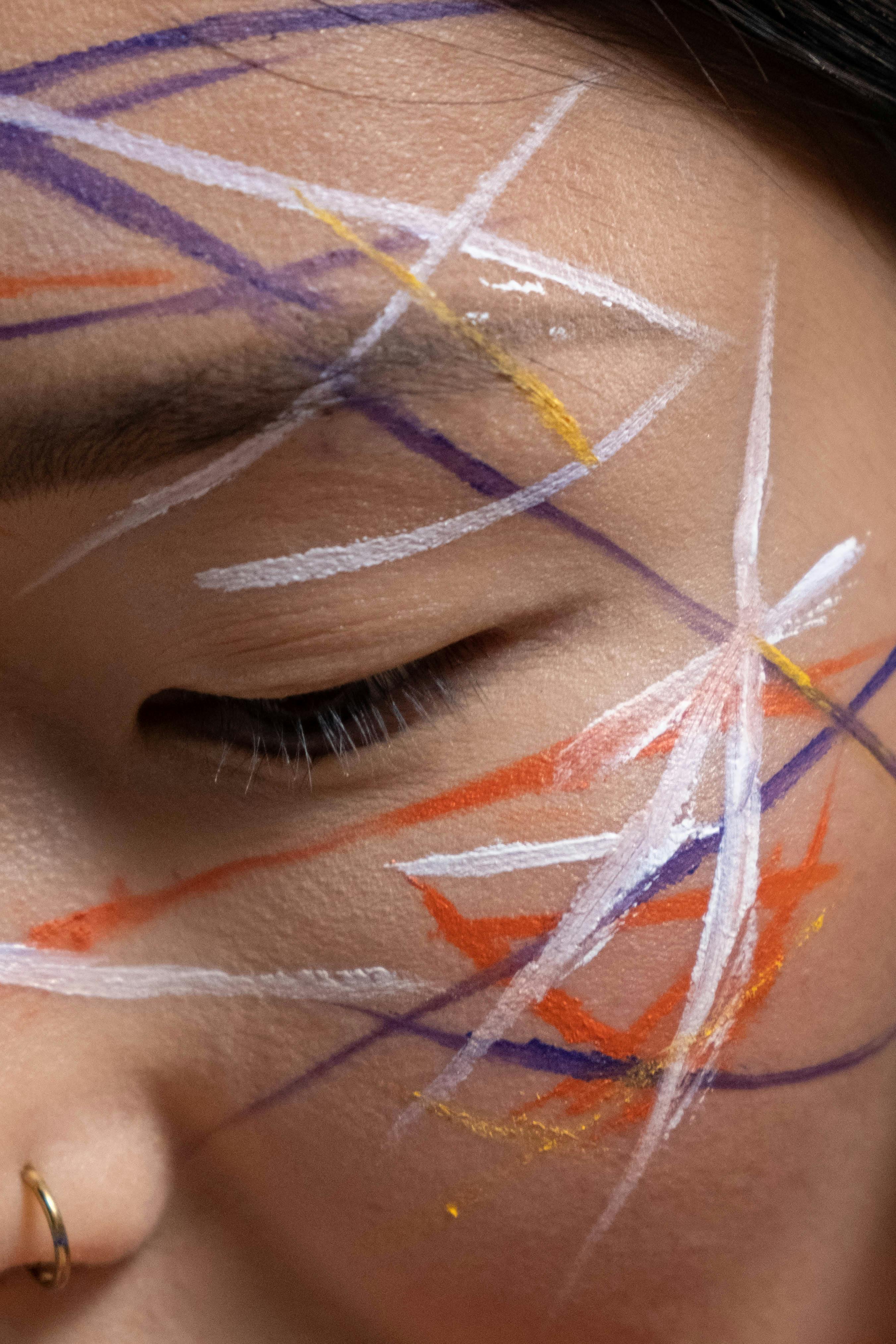 Woman With Multi Colored Paint on Face · Free Stock Photo