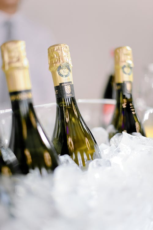 Free Bottles of champagne in ice cubes Stock Photo