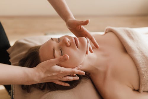 Free A Woman Having a Massage Stock Photo
