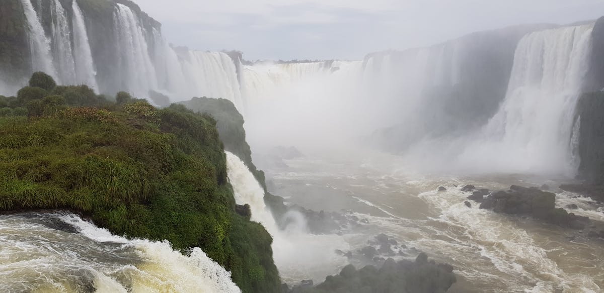 Woman experiencing sciatica leg pain on couch