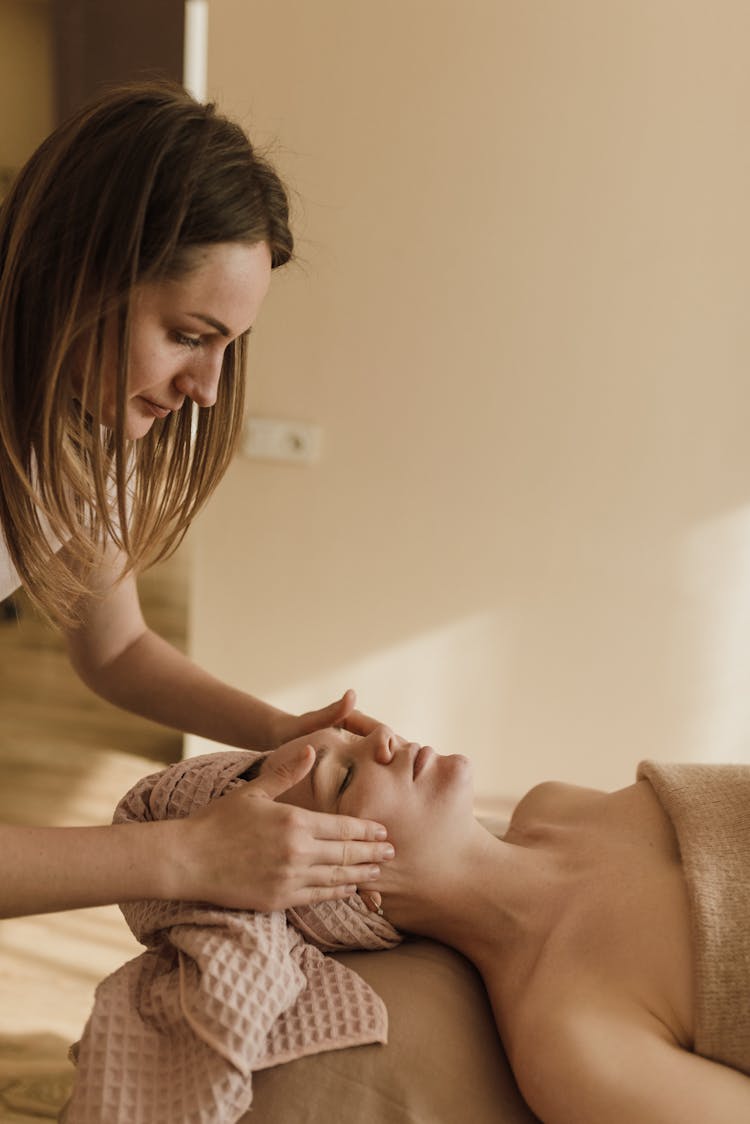 A Woman Having A Facial Massage