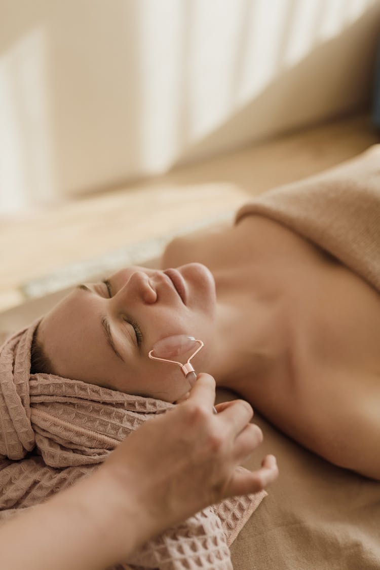 A Woman Having A Facial Massage