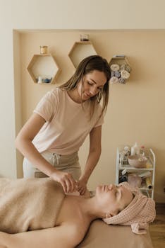 A spa session showcasing skincare and massage for relaxation and wellness.