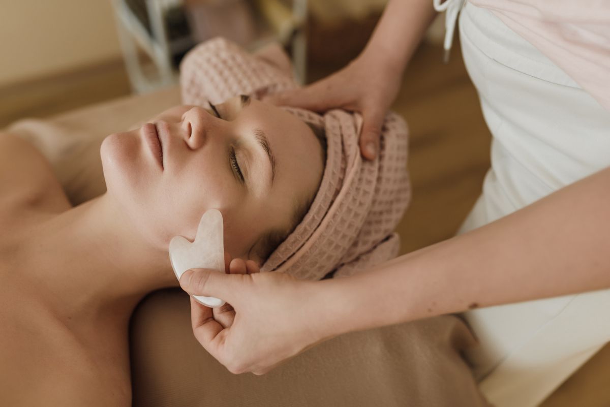 A calm spa facial treatment in a warm, quiet room