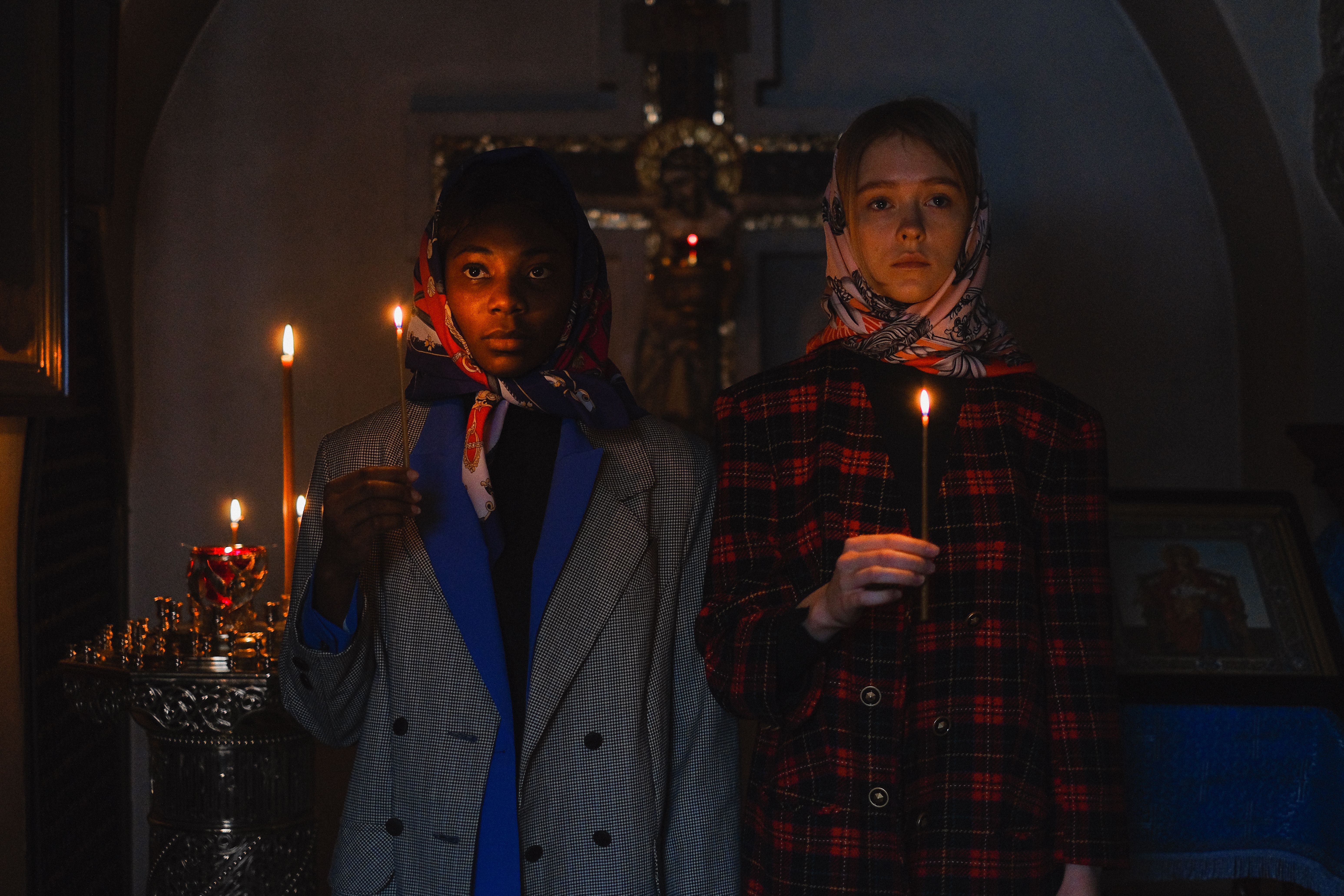 Free Man in Blue Coat Holding Lighted Candle Stock Photo