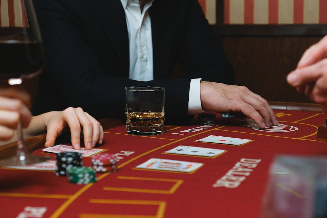 Free People Playing Poker in a Casino Stock Photo