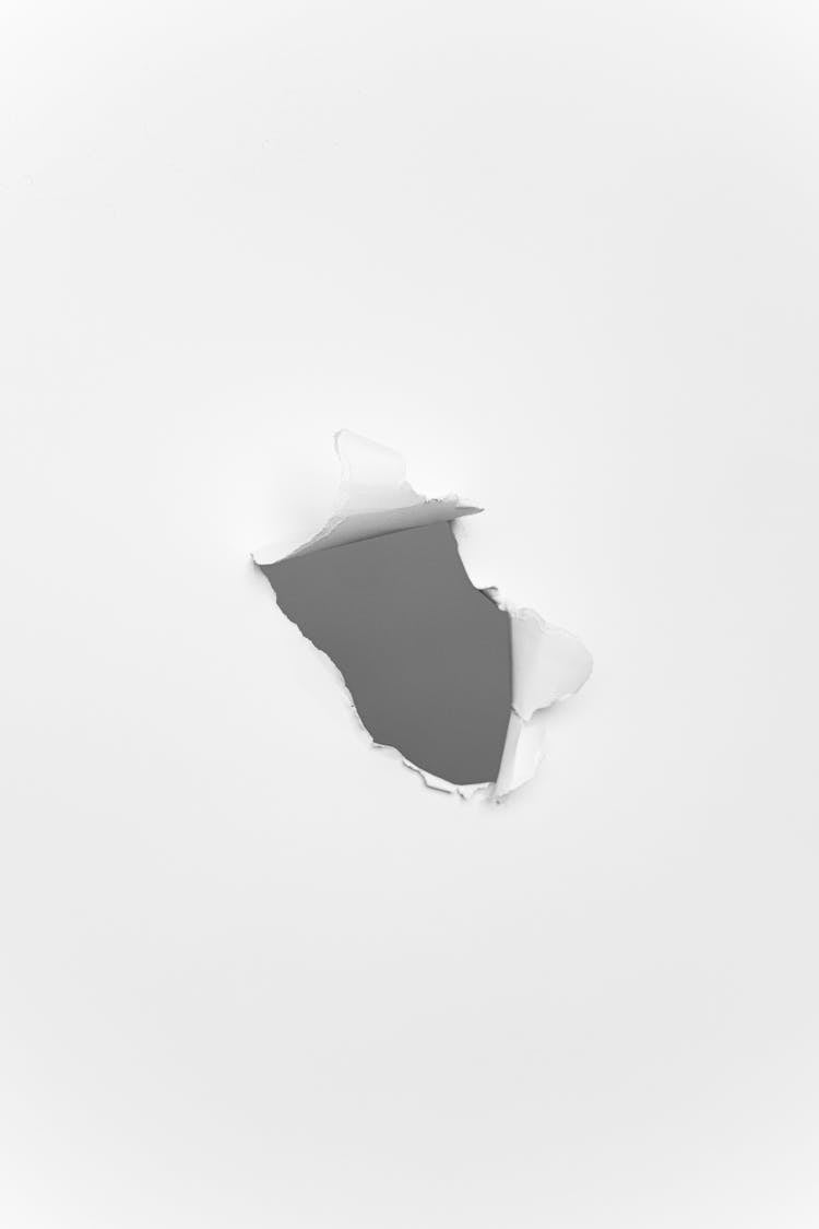 
A Hole On A White Paper