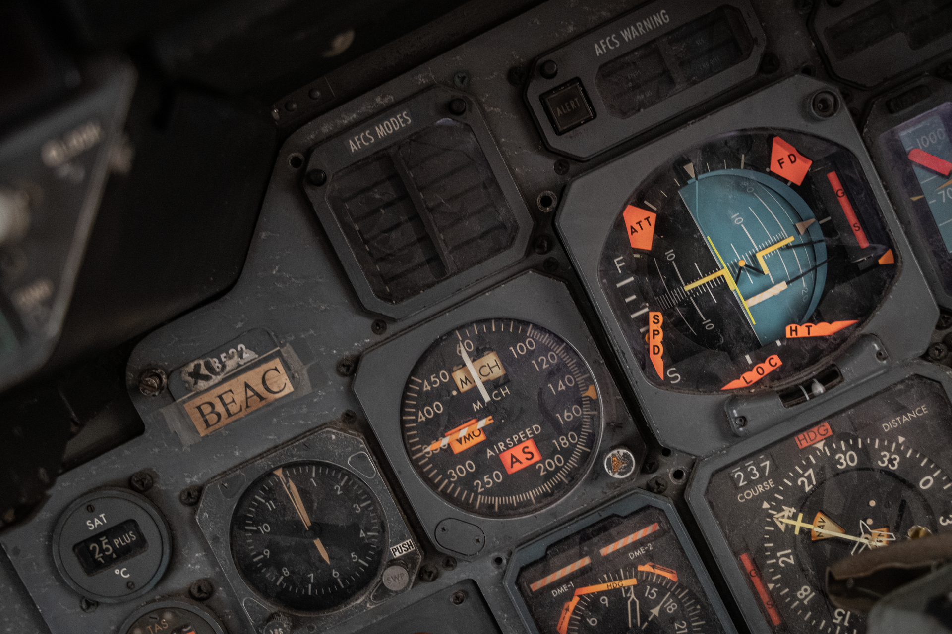 Detailed view of an aircraft control panel featuring instruments and gauges.