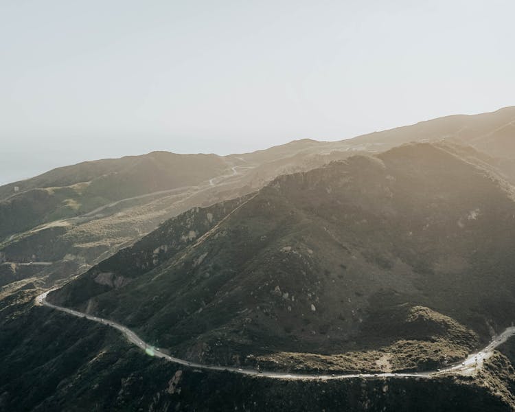 Mountain Peaks In Sun Landscape