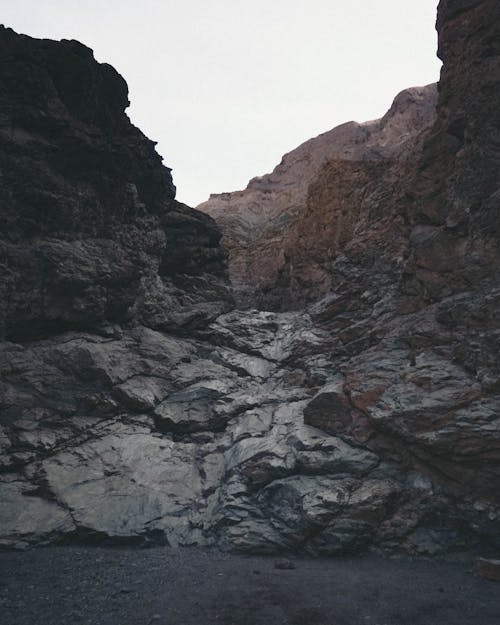 Rocky Mountain Under White Sky