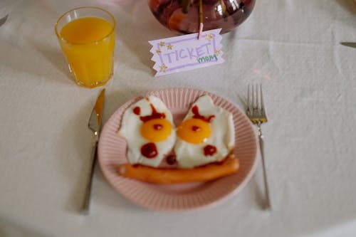 Free Two Eggs and Sausage With Ketchup  Stock Photo