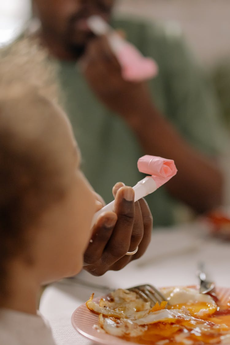 Father Hand Holding Child Party Whistle