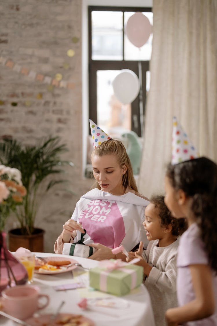 Mother Opening Present From Her Family