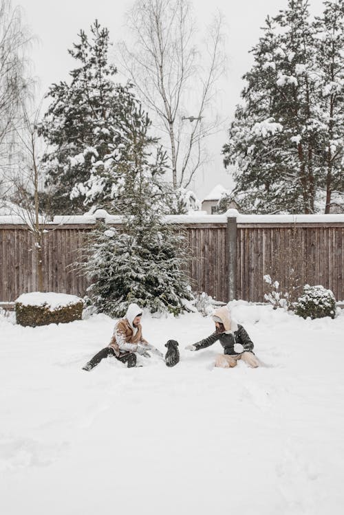 Romantic Couple Playing with Snow