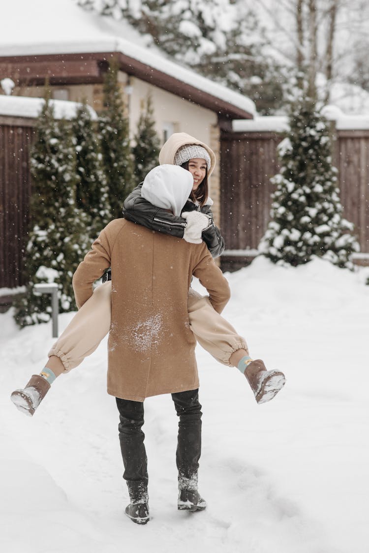 Man Carrying His Girlfriend