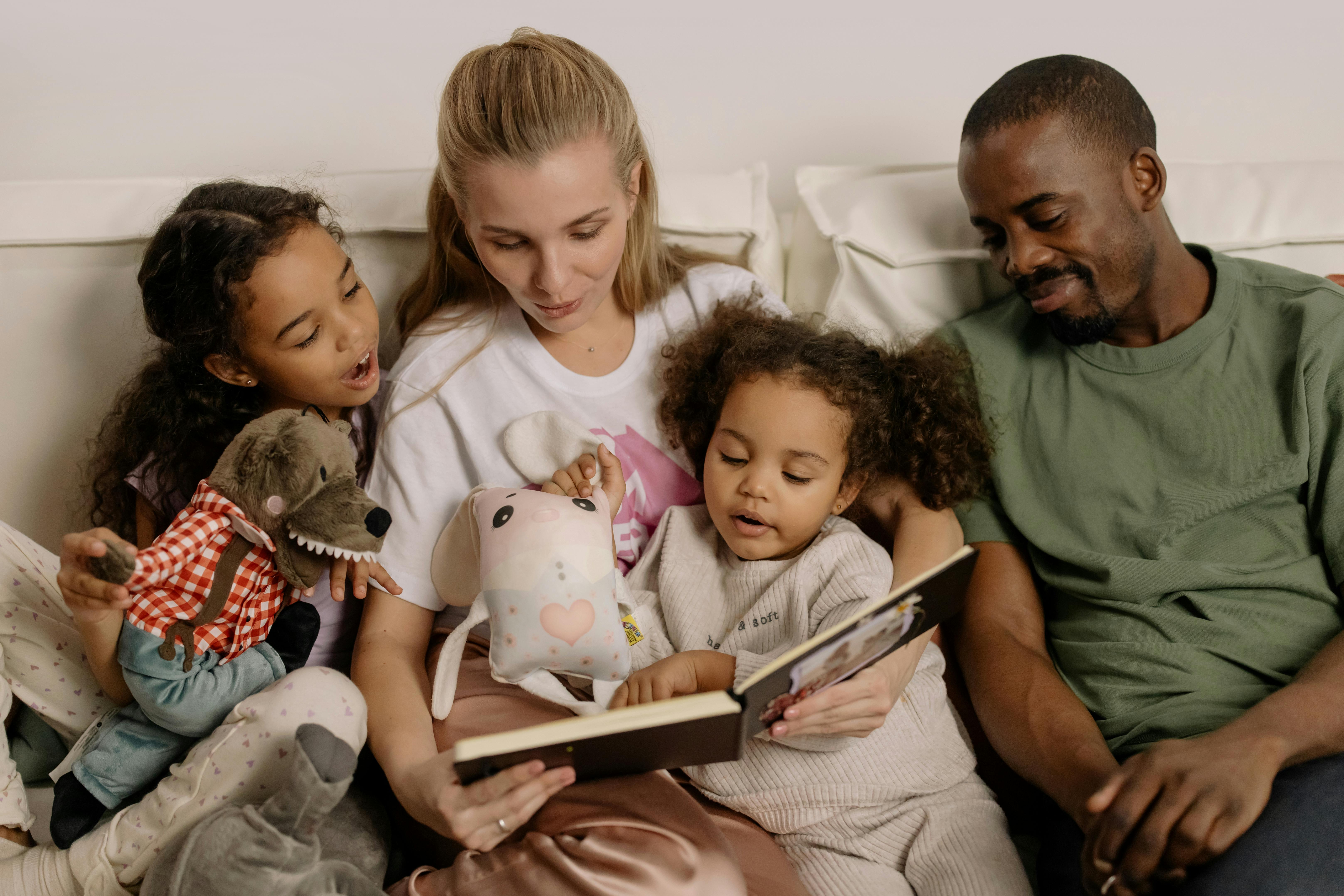 photograph of a family looking at a photo album