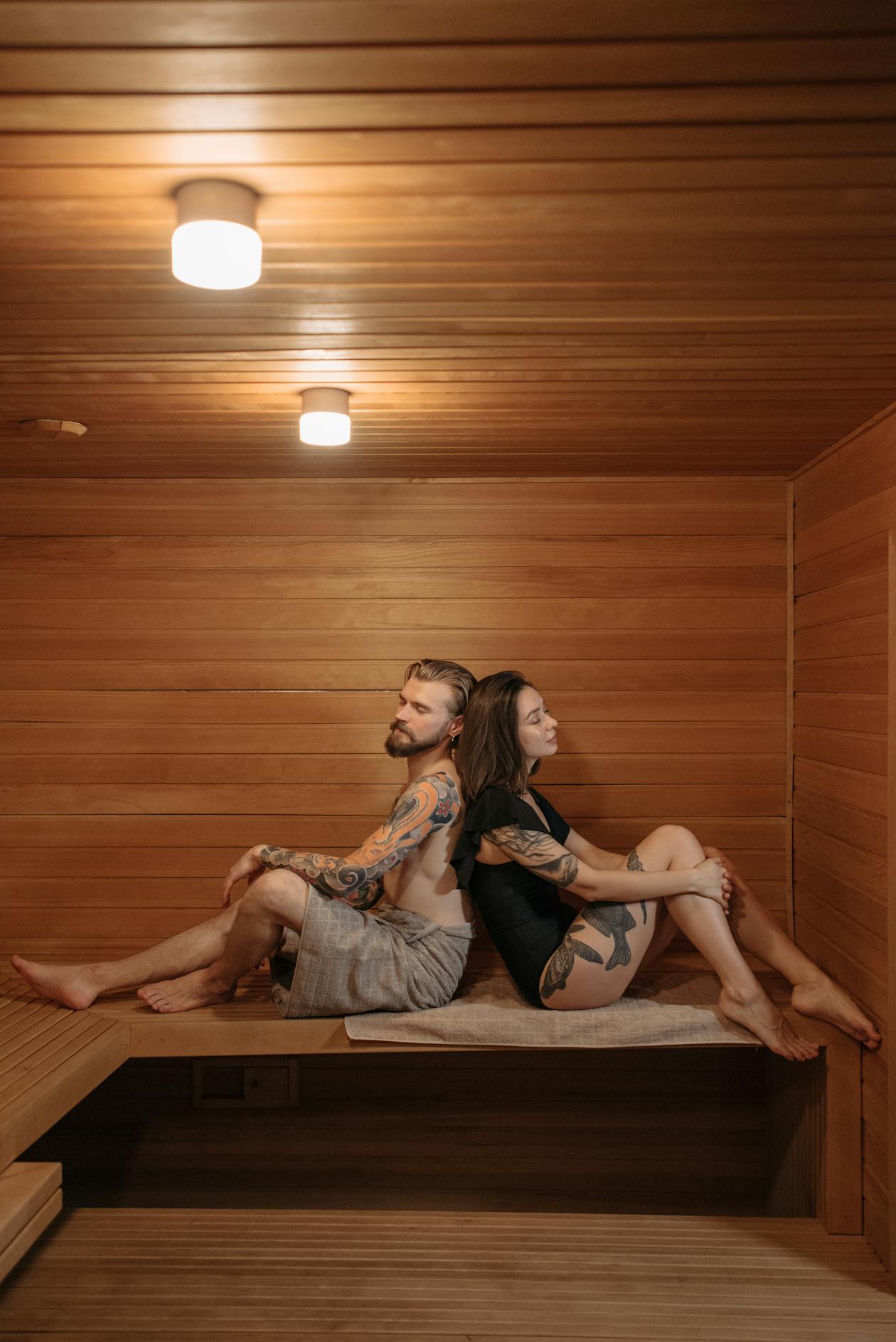 Warm relaxing sauna interior with wooden benches and ambient lighting