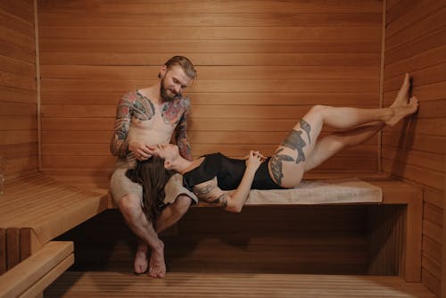 Free A Tattooed Couple in a Sauna Stock Photo