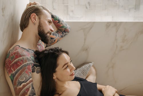 Free A Woman Leaning on Her Man Stock Photo