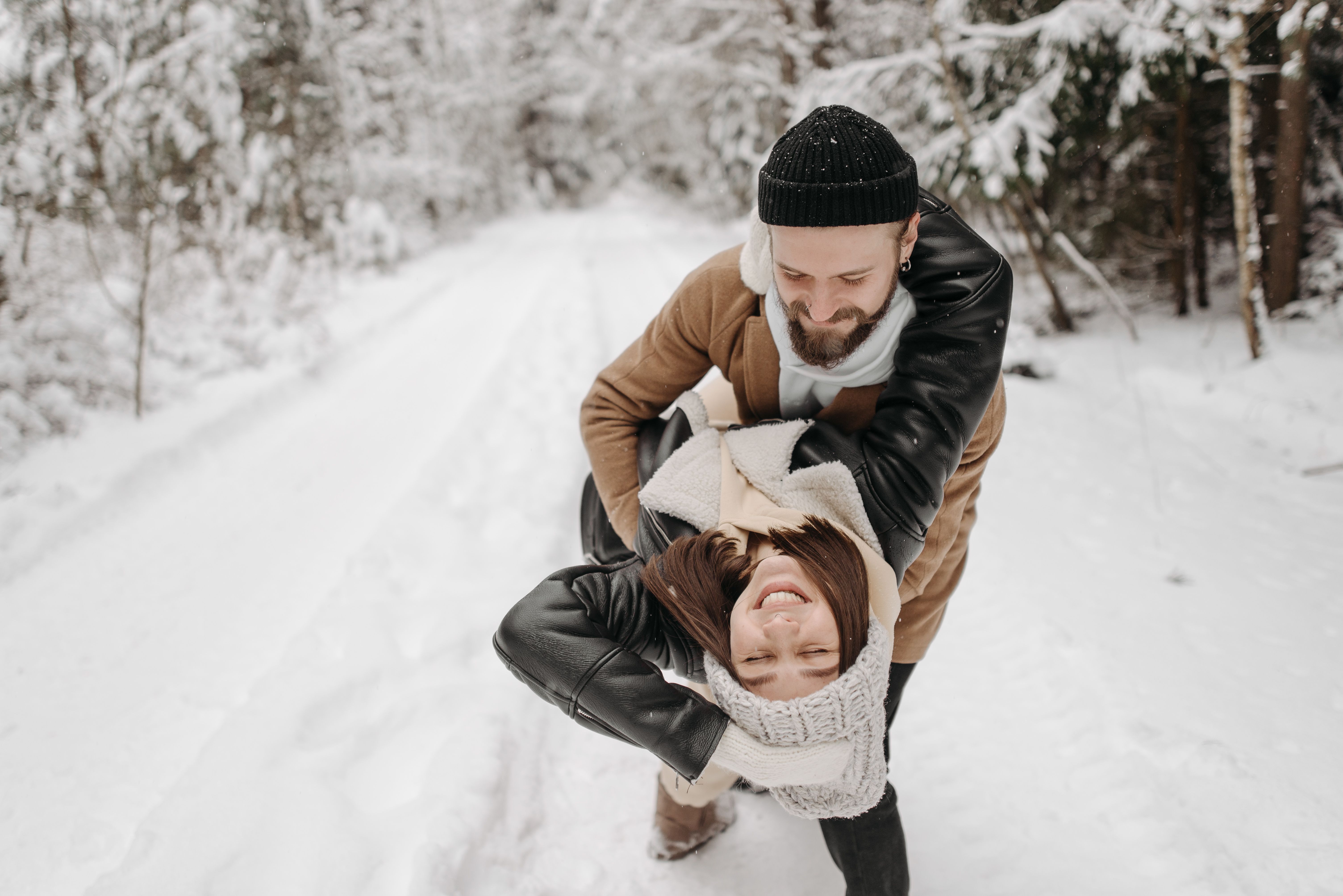 Smiling Couple Hugging in Forest in Winter · Free Stock Photo