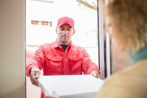 Delivery Man delivering a Parcel 