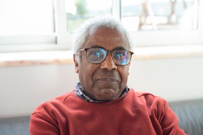 Close-up portrait of a senior man wearing glasses, indoors with natural light — photo by Kampus Production on Pexels